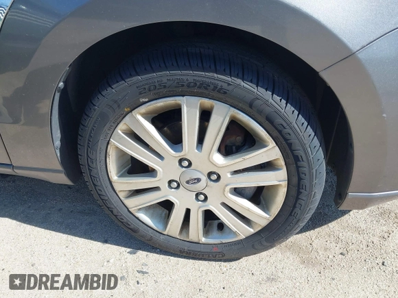 2009 Ford Focus SEL with VIN 1FAHP37N39W253086, listed as a IAAI auction lot 41825983 with 158,720 mi miles. Bid and sale history available at carsss.com. Image 18.