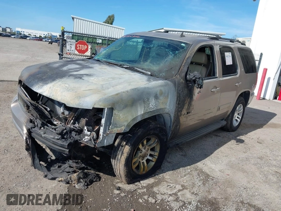 2007 Chevrolet Tahoe LS with VIN 1GNFC13J57R183484, listed as a IAAI auction lot 40837034 with Not provided miles and . Bid and sale history available at DreamBid. Image 2.