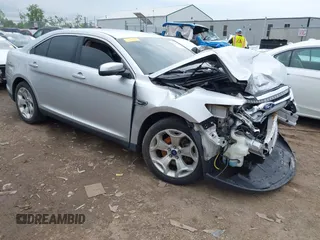2012 Ford Taurus SEL z VIN 1FAHP2EW1CG132855, wystawiony jako IAAI lot #42256022 z przebiegiem 177 749 mil mil oraz . Historia ofert i sprzedaży dostępna na DreamBid. Obrazek 1.