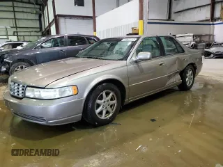 2001 Cadillac Seville Luxury SLS z VIN 1G6KS54Y91U243125, wystawiony jako Copart lot #45947755 z przebiegiem 169 483 mil mil oraz Nie do naprawy • Non repairable. Historia ofert i sprzedaży dostępna na DreamBid. Obrazek 1.