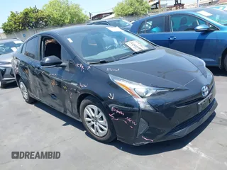 2016 Toyota Prius Two z VIN JTDKBRFU5G3014163, wystawiony jako IAAI lot #42475556 z przebiegiem 157 873 mil mil oraz . Historia ofert i sprzedaży dostępna na DreamBid. Obrazek 1.