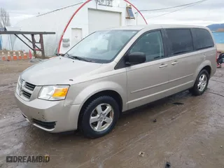 2009 Dodge Grand Caravan SE with VIN 2D8HN44E59R668785, listed as a IAAI auction lot 41072724 with 214,038 mi miles. Bid and sale history available at carsss.com. Image 18.
