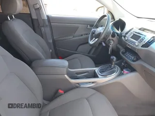 2012 Kia Sportage LX with VIN KNDPB3A27C7326884, listed as a IAAI auction lot 42010016 with 112,797 mi miles. Bid and sale history available at carsss.com. Image 5.