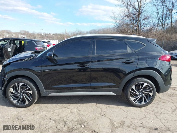 2021 Hyundai Tucson Sport with VIN KM8J3CAL6MU411855, listed as a IAAI auction lot 41694634 with 67,779 mi miles. Bid and sale history available at carsss.com. Image 15.