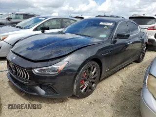 2019 Maserati Ghibli with VIN ZAM57XSS1K1335513, listed as a Copart auction lot 49609883 with 15,635 mi miles. Bid and sale history available at carsss.com. Image 1.