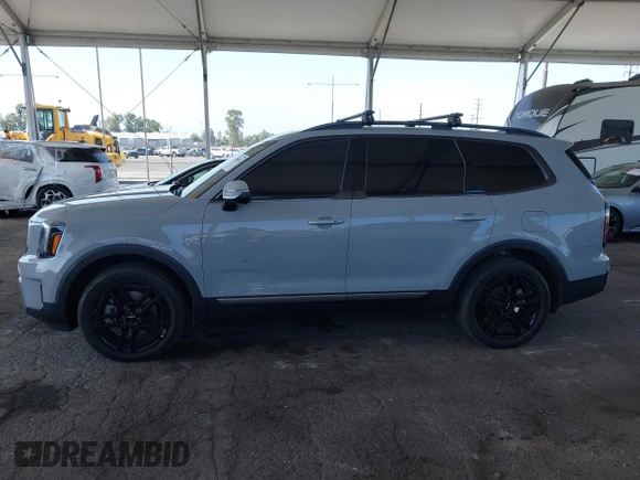 2023 Kia Telluride EX X-Line z VIN 5XYP3DGC0PG395945, wystawiony jako IAAI lot #42544923 z przebiegiem 19 046 mil mil oraz . Historia ofert i sprzedaży dostępna na DreamBid. Obrazek 14.