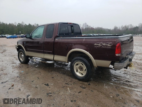 2000 Ford F-150 XL with VIN 1FTRX18L4YNA99427, listed as a Copart auction lot 49718795 with 0 mi miles and Salvage Title. Bid and sale history available at carsss.com. Image 2.