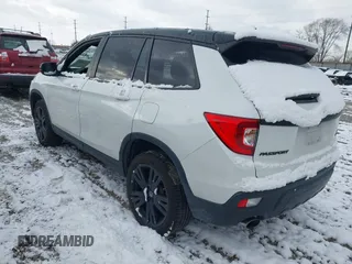 2021 Honda Passport Sport with VIN 5FNYF8H29MB009406, listed as a IAAI auction lot 41246817 with 71,997 mi miles and . Bid and sale history available at DreamBid. Image 3.