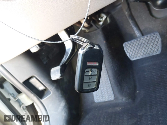 2018 Honda Pilot Touring with VIN 5FNYF6H95JB019122, listed as a IAAI auction lot 42439283 with 128,848 mi miles and . Bid and sale history available at DreamBid. Image 11.