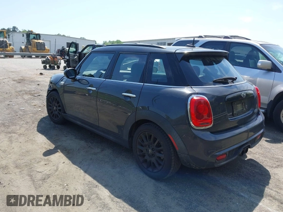 2017 MINI Hardtop 4 Door Cooper S z VIN WMWXU3C52H2D32498, wystawiony jako IAAI lot #42000212 z przebiegiem 70 231 mil mil oraz . Historia ofert i sprzedaży dostępna na DreamBid. Obrazek 3.
