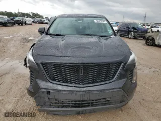 2023 Cadillac XT4 FWD Luxury with VIN 1GYAZAR45PF218684, listed as a Copart auction lot 54427565 with 74,920 mi miles and Salvage Title. Bid and sale history available at carsss.com. Image 5.