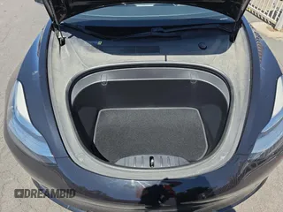 2018 Tesla Model 3 Long Range Battery z VIN 5YJ3E1EB8JF070461, wystawiony jako Copart lot #58379905 z przebiegiem 49 178 mil mil oraz Tytuł czysty. Historia ofert i sprzedaży dostępna na DreamBid. Obrazek 7.