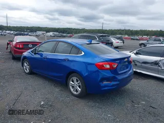 2016 Chevrolet Cruze LT z VIN 1G1BE5SM5G7321470, wystawiony jako IAAI lot #40456371 z przebiegiem 90 350 mil mil oraz . Historia ofert i sprzedaży dostępna na DreamBid. Obrazek 3.