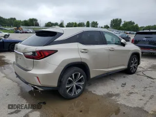 2017 Lexus RX 350 with VIN 2T2BZMCAXHC088983, listed as a Copart auction lot 59701005 with 128,421 mi miles and Clean title. Bid and sale history available at DreamBid. Image 3.