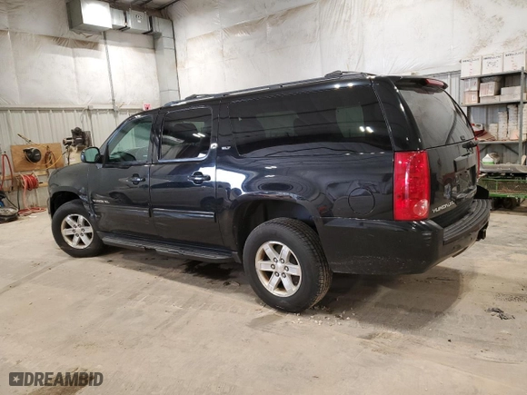 2013 GMC Yukon XL SLT with VIN 1GKS2KE74DR328905, listed as a Copart auction lot 52104955 with 196,447 mi miles and Clean Title. Bid and sale history available at carsss.com. Image 2.