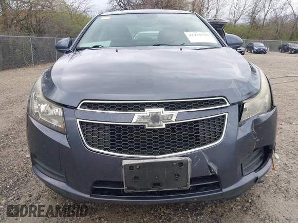 2014 Chevrolet Cruze 1LT z VIN 1G1PC5SB0E7213216, wystawiony jako IAAI lot #41955710 z przebiegiem 147 003 mil mil oraz . Historia ofert i sprzedaży dostępna na DreamBid. Obrazek 17.