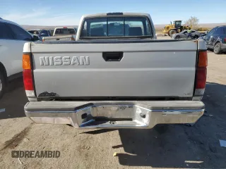 1996 Nissan Frontier XE z VIN 1N6SD11Y5TC327761, wystawiony jako Copart lot #79662594 z przebiegiem 151 631 mil mil oraz Szkoda całkowita • Salvage title. Historia ofert i sprzedaży dostępna na DreamBid. Obrazek 6.