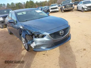 2014 Mazda 6 i Sport with VIN JM1GJ1U67E1158157, listed as a IAAI auction lot 41673848 with 191,663 mi miles. Bid and sale history available at carsss.com. Image 1.