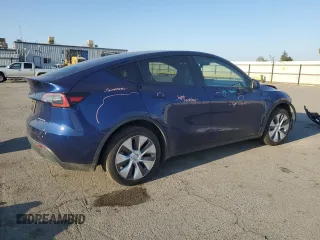 2023 Tesla Model Y Long Range with VIN 7SAYGDEE7PA146322, listed as a Copart auction lot 54071165 with 38,334 mi miles and Salvage Title. Bid and sale history available at DreamBid. Image 3.