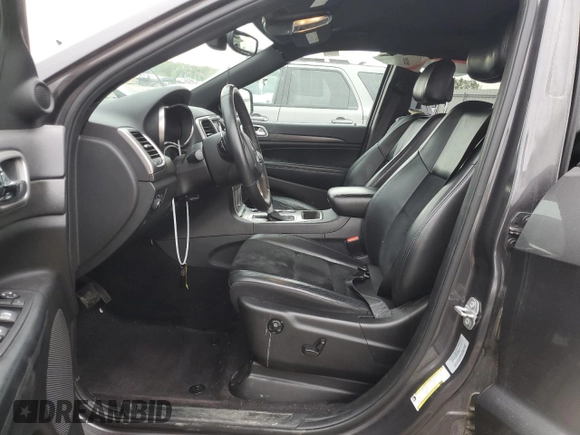 2017 Jeep Grand Cherokee Altitude z VIN 1C4RJFAG7HC778079, wystawiony jako Copart lot #55080265 z przebiegiem 76 405 mil mil oraz Szkoda całkowita • Salvage title. Historia ofert i sprzedaży dostępna na DreamBid. Obrazek 7.