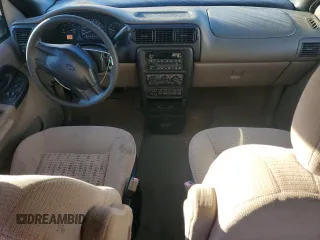 2003 Chevrolet Venture 1SA z VIN 1GNDX03E23D302043, wystawiony jako Copart lot #74490134 z przebiegiem 145 181 mil mil oraz Tytuł czysty. Historia ofert i sprzedaży dostępna na DreamBid. Obrazek 8.