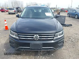 2021 Volkswagen Tiguan SE with VIN 3VV2B7AX4MM050282, listed as a IAAI auction lot 42124808 with 80,082 mi miles and . Bid and sale history available at DreamBid. Image 13.