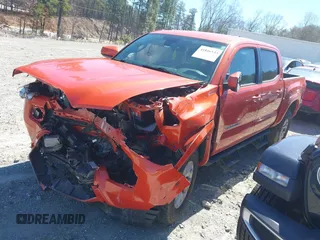 2018 Toyota Tacoma SR5 with VIN 5TFAZ5CN5JX066115, listed as a IAAI auction lot 41816133 with 70,283 mi miles and . Bid and sale history available at DreamBid. Image 2.