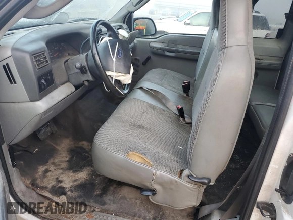 2004 Ford Super Duty F-250 XL with VIN 1FTNX20L34EB74712, listed as a Copart auction lot 72025064 with 141,857 mi miles and Salvage Title. Bid and sale history available at carsss.com. Image 7.