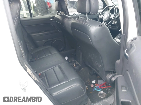 2016 Jeep Patriot High Altitude Edition with VIN 1C4NJRFB9GD808902, listed as a IAAI auction lot 41919059 with 123,265 mi miles. Bid and sale history available at carsss.com. Image 8.