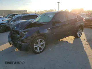 2014 BMW X6 xDrive35i with VIN 5UXFG2C52E0H09997, listed as a Copart auction lot 88328005 with 164,386 mi miles and Salvage Title. Bid and sale history available at carsss.com. Image 1.