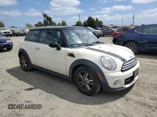 2012 MINI Hardtop with VIN WMWSU3C55CT540191, listed as a Copart auction lot 53096485 with 89,561 mi miles and Salvage Title. Bid and sale history available at DreamBid. Image 4.