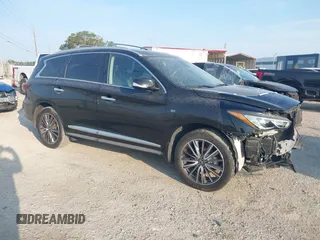 2020 Infiniti QX60 Signature Edition z VIN 5N1DL0MM0LC521823, wystawiony jako IAAI lot #42216632 z przebiegiem 126 193 mil mil oraz . Historia ofert i sprzedaży dostępna na DreamBid. Obrazek 1.