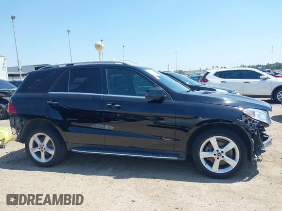 2018 Mercedes-Benz GLE 350 with VIN 4JGDA5JB0JB008547, listed as a IAAI auction lot 41985861 with 149,661 mi miles and . Bid and sale history available at DreamBid. Image 14.