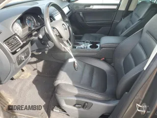 2016 Volkswagen Touareg Sport с VIN WVGEF9BPXGD007023, выставлен на аукционе Copart как лот 50760865 с пробегом 96 657 миль миль и Списание • Salvage title. История ставок и продаж доступна на DreamBid. Изображение 7.