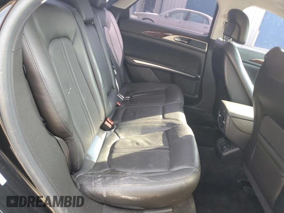 2014 Lincoln MKZ z VIN 3LN6L2JK1ER801584, wystawiony jako Copart lot #49283495 z przebiegiem 93 161 mil mil oraz Szkoda całkowita • Salvage title. Historia ofert i sprzedaży dostępna na DreamBid. Obrazek 10.