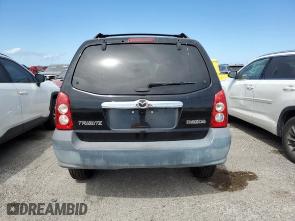 2005 Mazda Tribute i with VIN 4F2YZ02Z05KM51509, listed as a Copart auction lot 75985994 with Not Provided miles and Salvage Title. Bid and sale history available at carsss.com. Image 6.