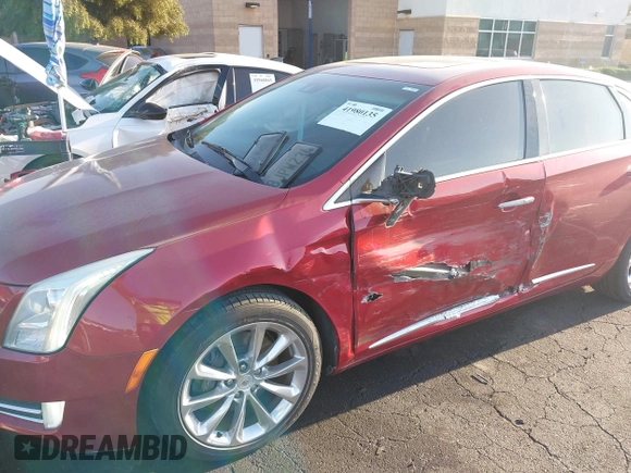 2013 Cadillac XTS Luxury with VIN 2G61P5S3XD9115546, listed as a IAAI auction lot 41980135 with 104,609 mi miles and . Bid and sale history available at DreamBid. Image 6.
