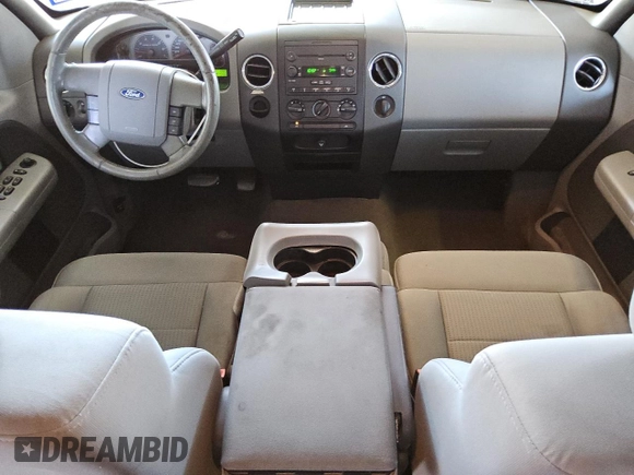 2007 Ford F-150 XLT z VIN 1FTRW02W17KD34981, wystawiony jako Copart lot #74465794 z przebiegiem 259 156 mil mil oraz Czysty tytuł • Clean title. Historia ofert i sprzedaży dostępna na DreamBid. Obrazek 8.