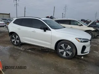 2024 Volvo XC60 Recharge Plug-In Hybrid Plus Dark Theme with VIN YV4H60DL7R1749677, listed as a Copart auction lot 82690254 with 11,789 mi miles and Salvage Title. Bid and sale history available at carsss.com. Image 4.
