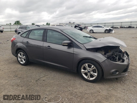 2013 Ford Focus SE with VIN 1FADP3F21DL320932, listed as a Copart auction lot 55031435 with 133,444 mi miles and Salvage title. Bid and sale history available at DreamBid. Image 4.