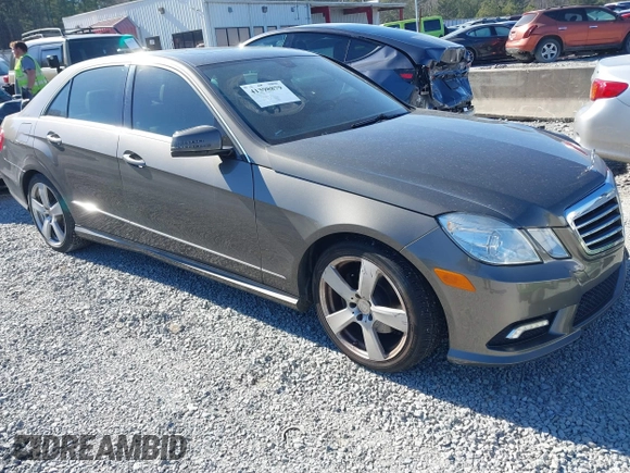2011 Mercedes-Benz E-Class E 350 Luxury with VIN WDDHF8HB7BA390393, listed as a IAAI auction lot 41398879 with 155,161 mi miles. Bid and sale history available at carsss.com. Image 1.
