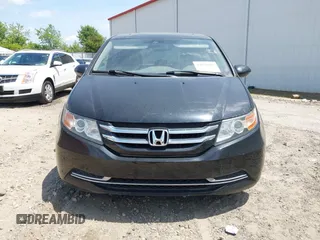 2014 Honda Odyssey EX-L with VIN 5FNRL5H66EB062158, listed as a IAAI auction lot 42072020 with 211,278 mi miles and . Bid and sale history available at carsss.com. Image 12.