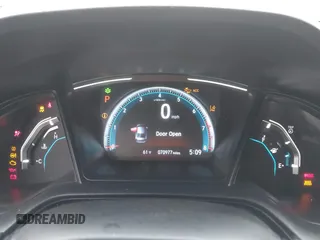 2020 Honda Civic LX with VIN 2HGFC2F63LH567698, listed as a IAAI auction lot 42354886 with 70,977 mi miles and . Bid and sale history available at DreamBid. Image 7.