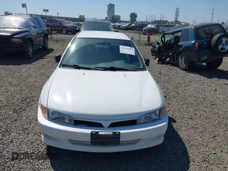 2000 Mitsubishi Mirage DE z VIN JA3AY26C4YU017932, wystawiony jako IAAI lot #42431603 z przebiegiem 193 139 mil mil oraz . Historia ofert i sprzedaży dostępna na DreamBid. Obrazek 6.
