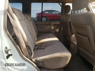 2000 Isuzu Trooper S with VIN JACDJ58X6Y7J06807, listed as a Copart auction lot 79179454 with 157,308 mi miles and Salvage title. Bid and sale history available at DreamBid. Image 11.