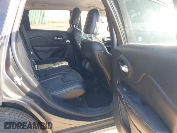2015 Jeep Cherokee Limited with VIN 1C4PJMDB4FW610956, listed as a IAAI auction lot 42167270 with 118,219 mi miles and . Bid and sale history available at DreamBid. Image 8.