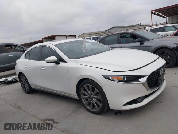 2021 Mazda 3 Preferred with VIN JM1BPACL3M1319795, listed as a IAAI auction lot 41780953 with 54,405 mi miles and . Bid and sale history available at DreamBid. Image 14.