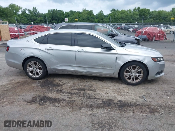 2014 Chevrolet Impala LT with VIN 2G1115SL4E9279660, listed as a IAAI auction lot 42675495 with 159,215 mi miles and . Bid and sale history available at DreamBid. Image 13.