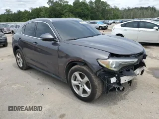 2018 Alfa Romeo Stelvio z VIN ZASFAKANXJ7C19707, wystawiony jako Copart lot #56553175 z przebiegiem 67 757 mil mil oraz Tytuł czysty. Historia ofert i sprzedaży dostępna na DreamBid. Obrazek 4.