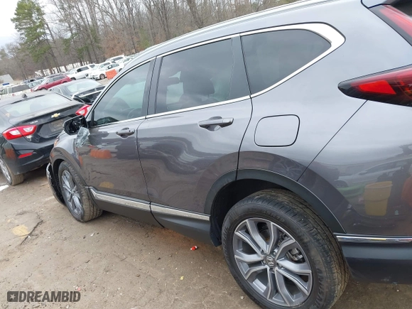2021 Honda CR-V Touring with VIN 2HKRW2H93MH675015, listed as a IAAI auction lot 41711953 with 58,287 mi miles. Bid and sale history available at carsss.com. Image 14.